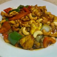 Cashew · Zucchini, carrot, mushrooms, green and red peppers, and white onions with cashew nuts in bro...