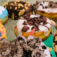 Mixed Donuts - Half Dozen · Baker's choice of half-dozen mixed donuts. 
 Excludes fritter, cinnamon roll, twist and long...