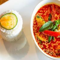 Red Curry · A flavorful favorite! Comes with zucchini, green beans, bell peppers, and onions.