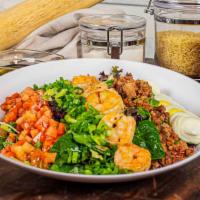 Cajun Cobb Salad · Mixed baby greens tossed with bleu cheese dressing, topped with cajun grilled chicken or shr...