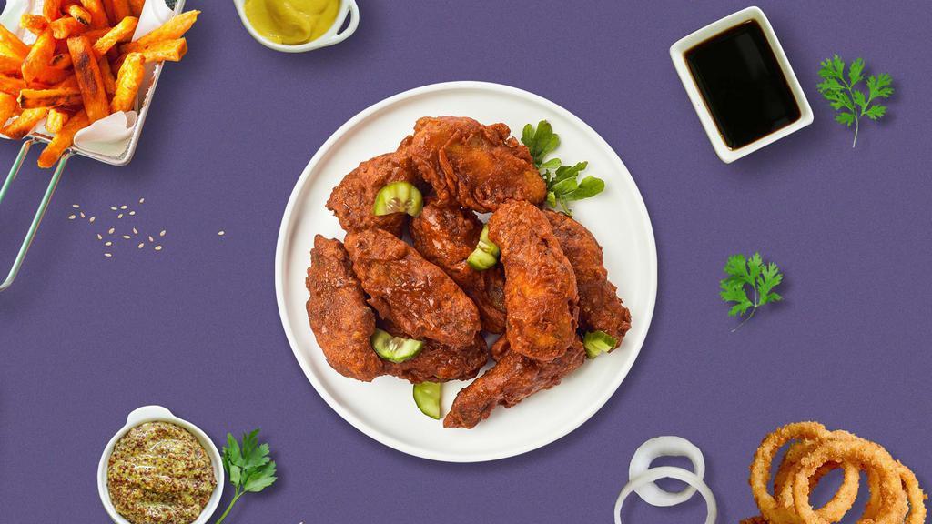 That'S Nash Hot Wings · Fresh chicken wings breaded, fried until golden brown, and tossed in Nashville Hot Sauce. Served with a side of ranch or bleu cheese.