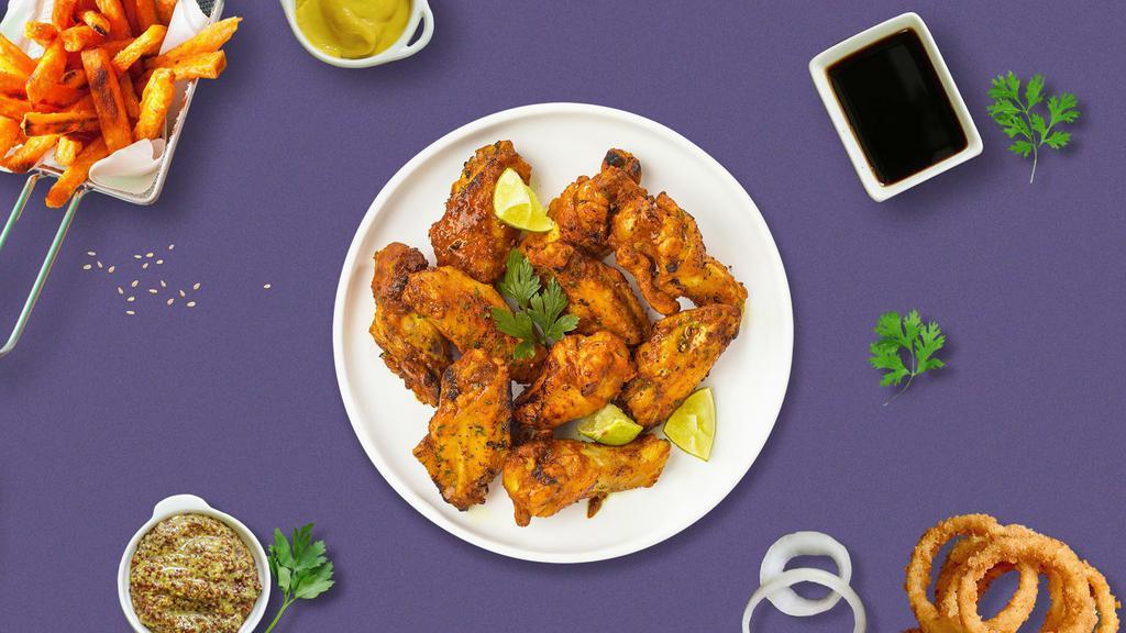 Lemon Song Pepper Wings · Fresh chicken wings breaded, fried until golden brown, and tossed in lemon pepper sauce. Served with a side of ranch or bleu cheese.