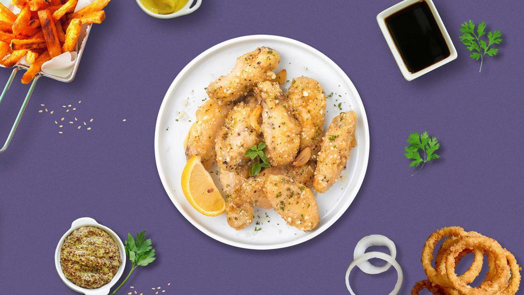 Garlic Parmesan Pretender Wings · Fresh chicken wings breaded, fried until golden brown, and tossed in garlic and parmesan. Served with a side of ranch or bleu cheese.