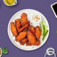 Chicken Wings Of An Angel · Fresh chicken wings breaded and fried until golden brown. Served with a side of ranch or ble...