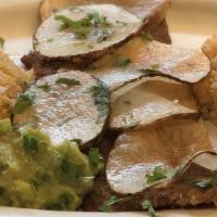 Carne Adobada / Marinated Meat · La versión mexicana de cerdo a la barbacoa servida con arroz, frijoles y ensalada. / The Mex...