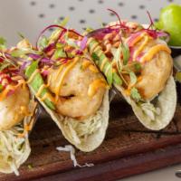 Shrimp Tacos (3) · Ensaladas with mayo chipotle, guacamole, pickled cabbage, and red onion. Three tacos with a ...