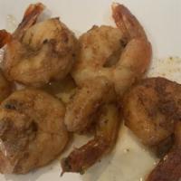 Jerk Shrimp  · Marinated in jerk seasoning and served with mango salsa and sour cream dip.