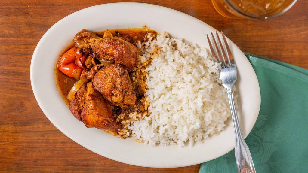Brown Stew Chicken · Flavorful stew of chicken seasoned with a homemade blend of Chef Barbara's secret ingredients served with rice.