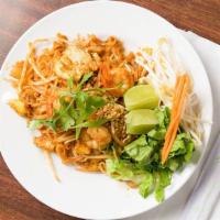 Paht Thai · Stir fried rice noodles, sprouts, 0nion and egg, served with lime wedge, peanuts and choice ...