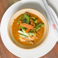 Keng Dang Curry · Thai red curry is cooked with signature coconut sauce, red bell peppers, green beans and bas...