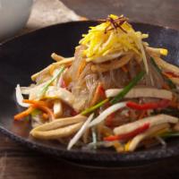 Tofu Japche · Vegetarian. Tofu cutlet, glass noodles, and vegetables with beef or not.