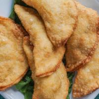 Crab Wonton · stuffed with crab meat, cream cheese, and onion