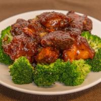 General Tso’S Chicken · Panko crusted dark meat chicken, and spicy honey glazed. 
Served with steamed or  fried rice.