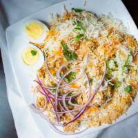 Chicken Biryani Rice · Seasoned long-grained fragrant Basmati rice sautéed with fresh garlic, ginger, cumin, tomato...