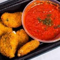 Bocconcino Di Formaggio · Breaded mozzarella sticks seasoned with italian herbs and spices, served with a side of home...