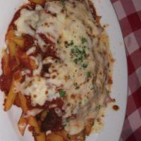 Pollo Alla Parmigiana · Breaded and pan fried chicken breast topped with homemade marinara sauce and baked with mozz...