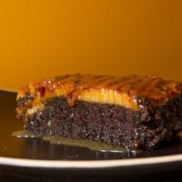Chocolate Caramel Custard Cake · Chocolate cake baked with a vanilla custard topped and covered with caramel.