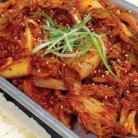 Tofu Kimchi · Very spicy. Steamed tofu with stir fried kimchi and pork.