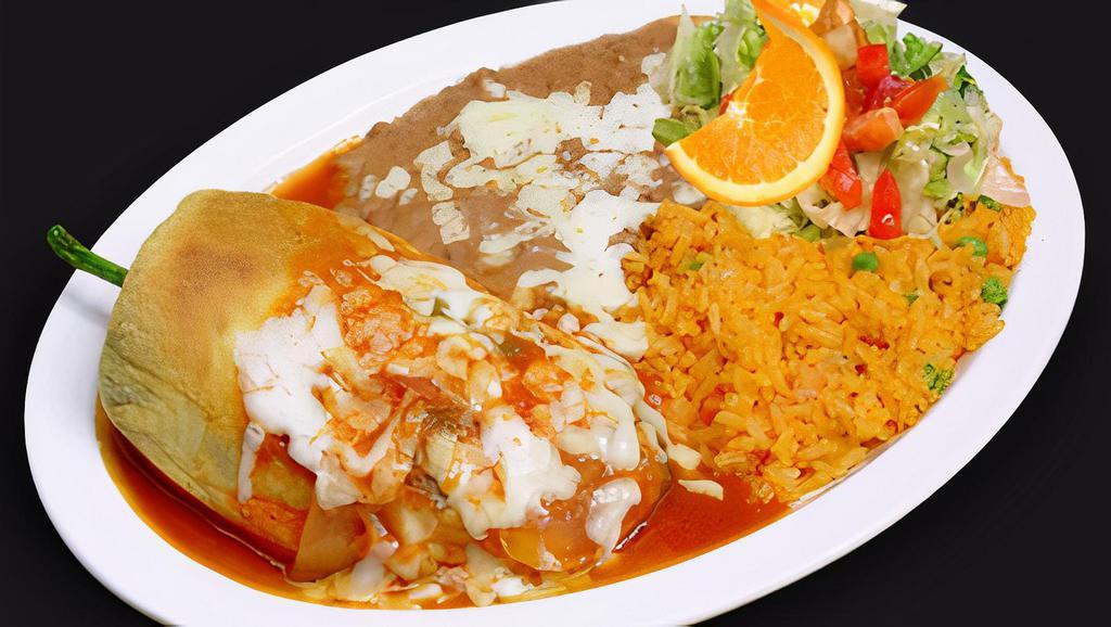 Chile Relleno · Poblano pepper stuffed with monterey cheese, and topped with our ranchero sauce and cheese. Served with a side of rice and refried beans. Your choice of flour tortillas or our handmade corn tortillas.