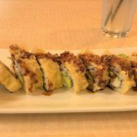 Crazy Boy · california roll with cream cheese , topped with sweet sauce.