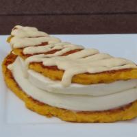 Cachapa (Cheese And Roasted Pork) · Sweet corn cake with venezuelan cheese and roasted pork.
