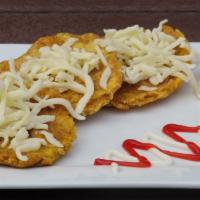 Tostones · Fried green plantains