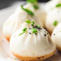 Pan Fried Pork Buns  生煎包 · Crunchy sesame-coated buns filled with pork and scallions