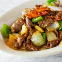 Pepper Beef 青椒牛 · Sliced beef with onions, bell peppers, black pepper