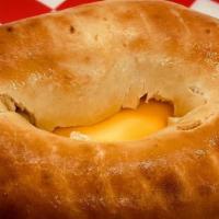 Bagel · Plain or everything bagel, fried or scrambled egg, mayo, cheese with your choice of ham, bac...
