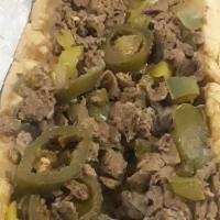 Peppered Cheesesteak · Sirloin steak, grilled onions and American-swiss cheese kicked with jalapenos, banana pepper...