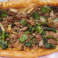 Poblano Cheesesteak · Our famous traditional cheesesteak (grilled onions and American swiss cheese) topped with ro...