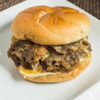 Alan Burger · Our traditional handmade 1/2 burger, topped with a mountian of our famous philly cheesesteak...