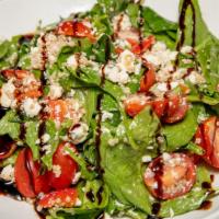 Valencia · Elegant combination of spinach and wholesome quinoa perfectly mixed with tomato, roasted pep...