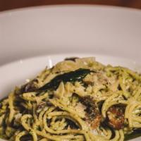 Pesto Di Genoa · Traditional spaghetti in basil pesto sauce with chicken and fresh mushrooms.