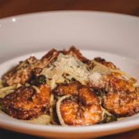 Gamberi Spaghetti · Italian classic spaghetti and shrimp tossed in light lemon butter sauce, topped with capers.