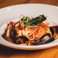 Spaghetti Pescatore · A taste sensation reminisce of the Mediterranean summer combining mussels, shrimp, calamari,...