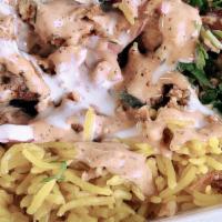 Chicken Rice Plate · Not your standard meat over rice! Tender chicken skewers served over basmati rice and topped...