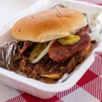 Big Neal'S Sandwich · Chopped brisket, Meyer's sausage, pickles, onions and sauce on a bun. Best of both worlds!