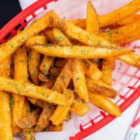 Garlic Fries · crispy seasoned fries tossed in garlic powder, garlic salt and parsley served with 2oz ketchup