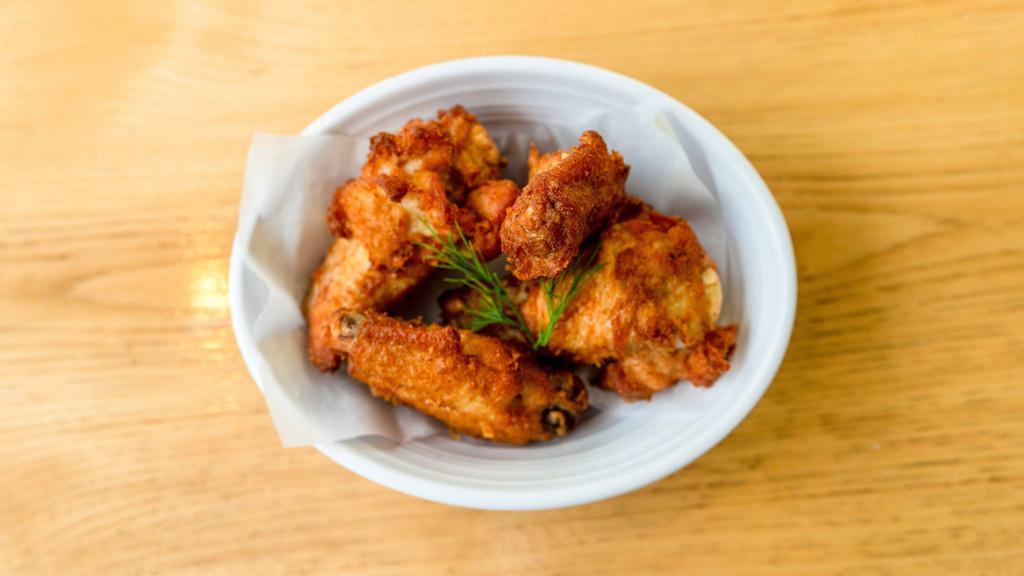 Crispy Chicken Wings · Gluten Free. Four pieces served with side of yuzu mayonnaise.