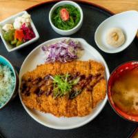 Set Katsu Pork · Panko breaded pork with cabbage slaw. Served with a side of rice, pickled vegetables, miso s...