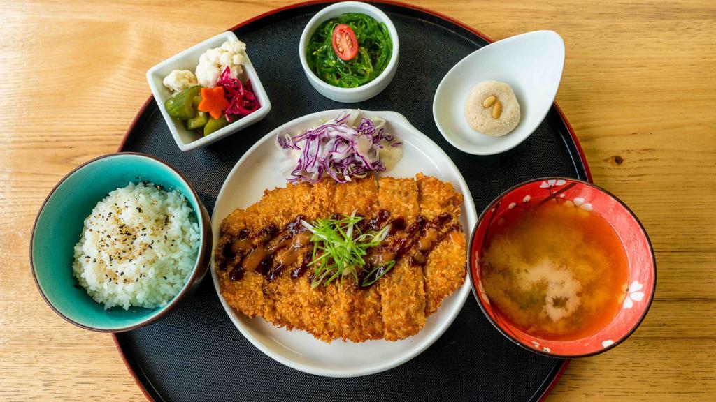 Set Katsu Pork · Panko breaded pork with cabbage slaw. Served with a side of rice, pickled vegetables, miso soup, seaweed salad, and a gluten free almond cookie.