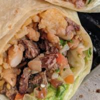 Big Burrito · Meat, rice, beans, lettuce, tomato, cheese, and sour cream. Double the meat for an additiona...