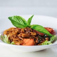 Pad Kee Mow · Spicy. rice noodle, chili, black soy, Thai basil, egg, red bell pepper, tomato, romaine lett...