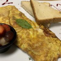 Cowboy Meat Lover Omelette · Three eggs omelet, stuffed with bacon, pork sausage, ham, onions, tomatoes, Mozzarella chees...
