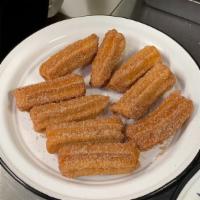 Classic Churros Bites (6 Pack) · Served with a choice of dipping sauce. Two sauces.