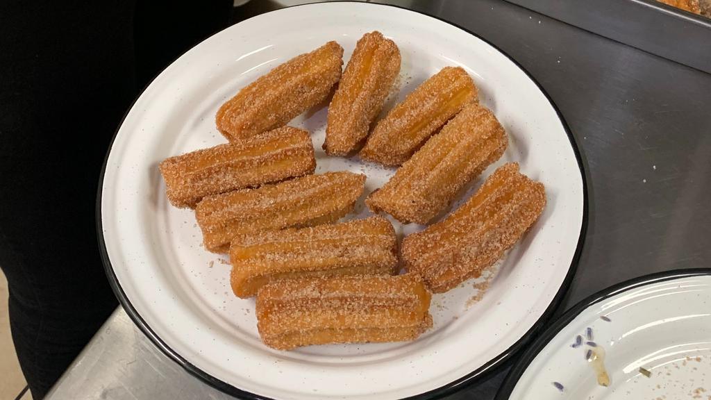 Classic Churros Bites (9 Pack) · Served with a dipping sauce of choice. Three sauces included.