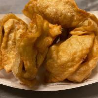 Fried Meat Wontons (6) · House made pork wontons deep-fried served with choice of dipping sauce. (mild ginger dipping...