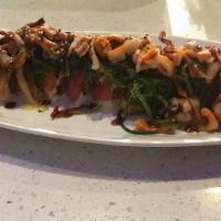 31 Special Roll · Spicy. Inside spicy tuna  teriyaki sauce rolled  tuna and salmon. Served   squid and seaweed...