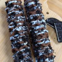 Cookies & Cream · Double Chocolate waffles with creamy vanilla icing and Oreo Cookie crumble.